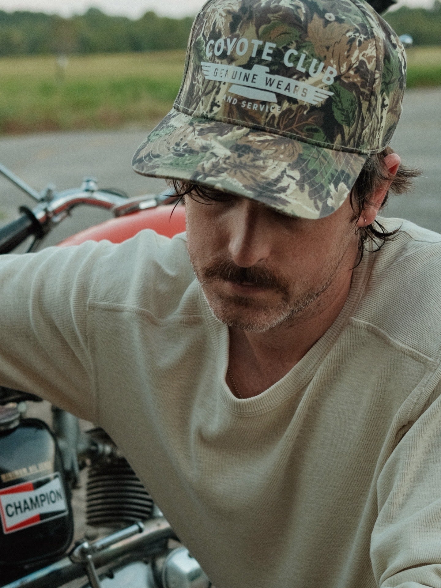 ‘GENUINE WEARS’ CAMO TRUCKER