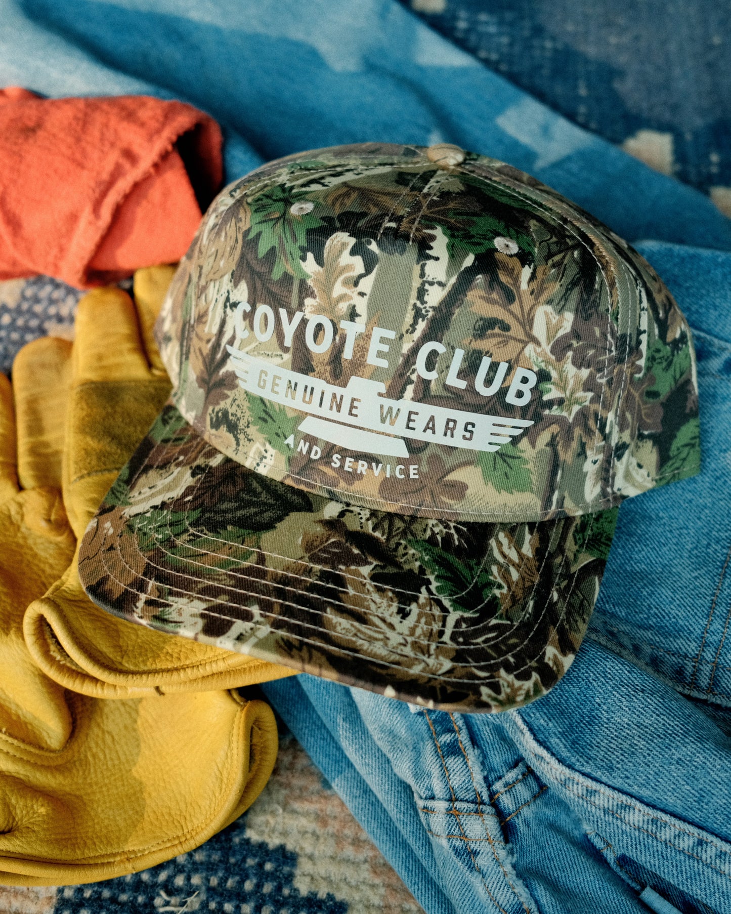 ‘GENUINE WEARS’ CAMO TRUCKER