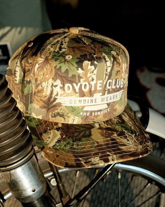‘GENUINE WEARS’ CAMO TRUCKER
